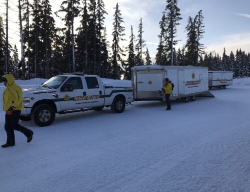 STUCK SNOWMOBILE RIDER RESCUED